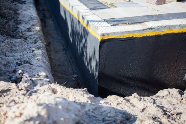 Professional Waterproofing technician working in Beaver Dam, KY